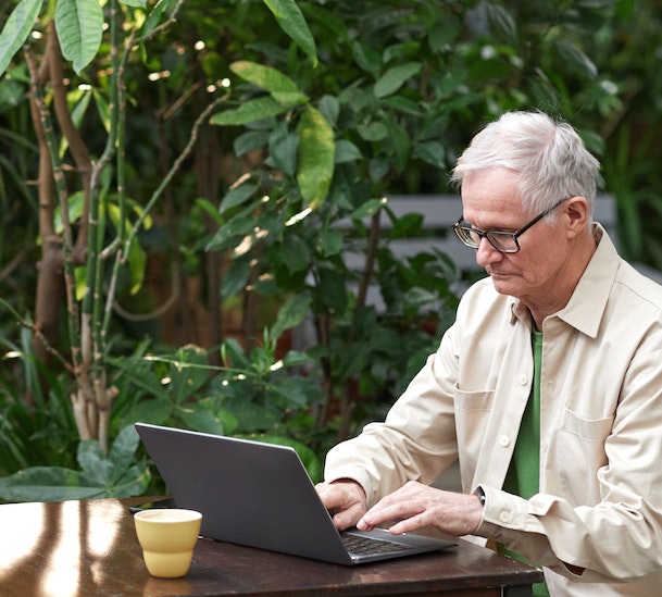 Business Owners estate plan man on computer